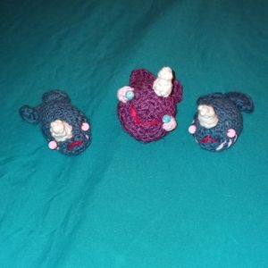 3 three cute hand crocheted narwhals. 2 Grey and 1 burgundy. Soft sculpture.